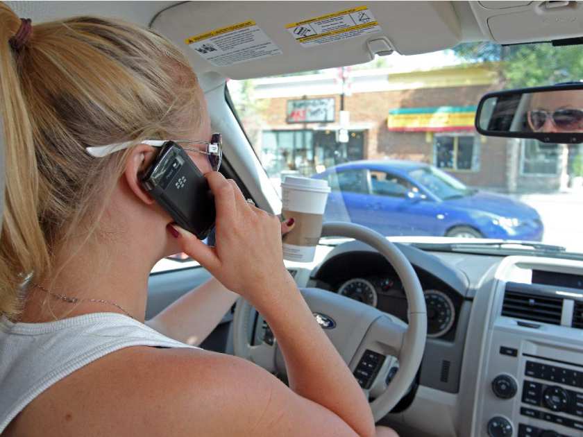 Beginning Sept. 1, the minimum fine in Ontario for drivers caught using electronic devices rises from $280 to $490. COLLEEN DE NEVE / CALGARY HERALD