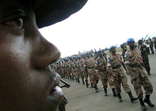 A key player in peacekeeping in Africa, Rwanda, whose troops are pictured on November 22, 2005, offered two attack helicopters, two field hospitals, an all-female police unit and 1,600 new troops (AFP Photo/Jose Cendo