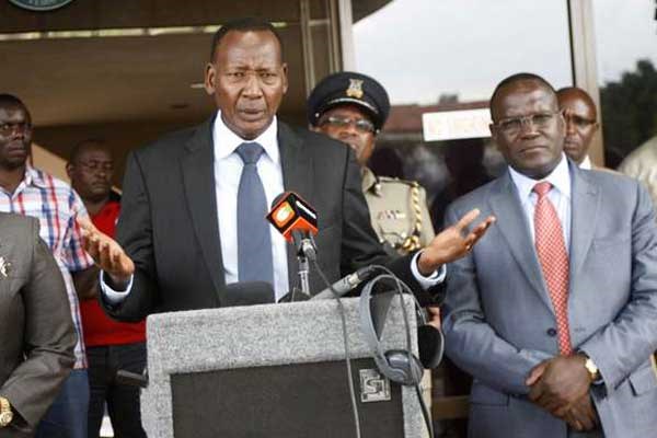 Internal Security Cabinet Secretary Joseph Nkaissery (centre) with his Health counterpart Dr Cleopa Mailu addressing journalists after visiting Kenya Medical Research Institute on April 15, 2016. Police said they have foiled a planned biological attack using anthrax and arrested three suspects. FILE PHOTO | CHRIS OMOLLO