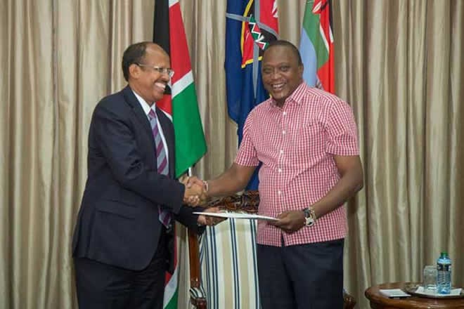 President Uhuru Kenyatta (right) with Djibouti foreign affairs minister Mahmoud Ali Youssouf at State House in Nairobi on January 19, 2017. Kenya has reached out to Djibouti to support Foreign Affairs CS Amina Mohamed for the post of African Union Commission chairperson. PHOTO | PSCU